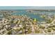 An aerial shot of a waterfront community showing the proximity to the open bay at 14031 E Parsley Dr, Madeira Beach, FL 33708