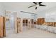 Bedroom with exposed studs and adjoining bathroom at 14031 E Parsley Dr, Madeira Beach, FL 33708