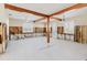 Bright living room featuring exposed wood beams and studs, offering a glimpse of the home's remodeling journey at 14031 E Parsley Dr, Madeira Beach, FL 33708