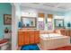 Spacious bathroom with a soaking tub, dual vanities, and a separate toilet area ensuring privacy and style at 14315 Rolling Dune Rd, Lithia, FL 33547