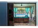 Beautiful view of the outdoor lanai with a sitting area and view of the sparkling screened-in pool at 14315 Rolling Dune Rd, Lithia, FL 33547