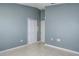 Bedroom with tile flooring, neutral walls and closet space perfect for customization at 1610 Bondurant Way, Brandon, FL 33511