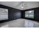 Bedroom with tile flooring, natural light, and neutral walls, providing a blank canvas at 1610 Bondurant Way, Brandon, FL 33511
