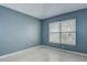 Bedroom with tile flooring, neutral walls and a large window that lets in natural light at 1610 Bondurant Way, Brandon, FL 33511