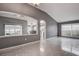 Open living area with large windows, tile flooring and ample natural light at 1610 Bondurant Way, Brandon, FL 33511