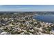 An aerial shot of a coastal community with lush greenery, waterfront homes, and scenic canals at 1859 Oklahoma Ne Ave, St Petersburg, FL 33703