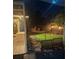 Charming backyard with manicured lawn and inviting ambiance with a custom fire pit area at 1859 Oklahoma Ne Ave, St Petersburg, FL 33703