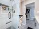 Clean, glass enclosed shower with shelving built in at 1859 Oklahoma Ne Ave, St Petersburg, FL 33703