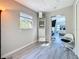 Cozy bedroom area with ample natural light and a decorative shelf with easy access to the main bedroom at 1859 Oklahoma Ne Ave, St Petersburg, FL 33703