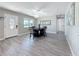 Dining area featuring modern decor, wood-look flooring and plenty of natural light at 1859 Oklahoma Ne Ave, St Petersburg, FL 33703