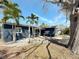 Cozy single-Gathering home with palm trees and a tree swing, offering a tranquil outdoor experience at 1859 Oklahoma Ne Ave, St Petersburg, FL 33703
