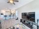 Open-concept space featuring modern living room flowing seamlessly into the kitchen at 1859 Oklahoma Ne Ave, St Petersburg, FL 33703