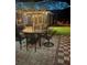 Outdoor patio boasts an umbrella-covered dining set and direct access to a screened-in porch for outdoor enjoyment at 1859 Oklahoma Ne Ave, St Petersburg, FL 33703