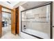 Bathroom featuring a shower and tub combination with tile surround at 1906 Del Oro Ct, Dunedin, FL 34698