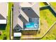 Backyard features a screen enclosed pool and plenty of green space at 19730 Preservation Woods Dr, Lutz, FL 33558