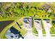Aerial view of the property showcasing a pool and wooded surroundings at 19730 Preservation Woods Dr, Lutz, FL 33558