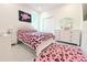 Charming bedroom featuring colorful decor, and a plush rug for a comfortable space at 19730 Preservation Woods Dr, Lutz, FL 33558