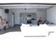 Open living space with kitchen, dining area and garage access at 19730 Preservation Woods Dr, Lutz, FL 33558