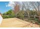 Enjoy this spacious balcony with lovely green backyard scenery at 2213 Spanish Vistas Dr, Dunedin, FL 34698