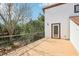 This beautiful terrace has views of the home's backyard and landscaping at 2213 Spanish Vistas Dr, Dunedin, FL 34698