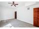 Bedroom featuring carpet flooring, and 2 doors at 2213 Spanish Vistas Dr, Dunedin, FL 34698