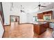 Spacious open kitchen with stainless appliances, granite counters, and an island at 2213 Spanish Vistas Dr, Dunedin, FL 34698