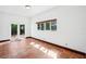 Room with natural light from windows and sliding doors at 2213 Spanish Vistas Dr, Dunedin, FL 34698