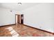 Room with tile floors and 2 doors at 2213 Spanish Vistas Dr, Dunedin, FL 34698