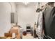 A storage area featuring shelving, boxes, and a step ladder, offering practical space for organization at 2333 Feather Sound Dr # A204, Clearwater, FL 33762