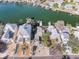 Aerial view of waterfront houses with boat docks along a canal at 300 16Th Ave, Indian Rocks Beach, FL 33785
