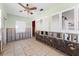 Large room with windows and tiled flooring, awaiting finishing and personalization at 300 16Th Ave, Indian Rocks Beach, FL 33785