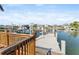 Waterfront home features a private boat dock with boat lift and canal views at 300 16Th Ave, Indian Rocks Beach, FL 33785