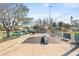 A community skate park is seen with concrete ramps, providing recreational opportunities for skateboarding enthusiasts at 300 16Th Ave, Indian Rocks Beach, FL 33785