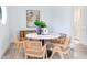 Cozy dining area with stylish chairs, marble table, and modern decor at 3030 W Santiago St # 3, Tampa, FL 33629