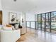 Comfortable living area with neutral furnishings and a view of neighborhood at 3030 W Santiago St # 3, Tampa, FL 33629
