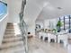 Open concept home with staircase, dining area, and a view into the living room, showing an inviting living space at 3030 W Santiago St # 3, Tampa, FL 33629