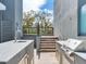 Outdoor kitchen with built-in grill and sink, perfect for outdoor cooking and entertaining at 3030 W Santiago St # 3, Tampa, FL 33629