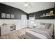 Cozy bedroom with vaulted ceilings, natural light, and stylish gray accents at 3206 Hurley Grove Way, Valrico, FL 33596