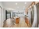 Beautiful eat-in kitchen featuring an island with bar seating and stainless steel appliances at 3206 Hurley Grove Way, Valrico, FL 33596