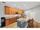 Modern kitchen with stainless steel appliances, ample cabinet space, and a spacious center island at 3206 Hurley Grove Way, Valrico, FL 33596