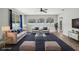 Comfortable living room with contemporary design, large windows, and stylish decor at 3206 Hurley Grove Way, Valrico, FL 33596