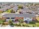 Aerial view showcasing an apartment complex with mature trees and landscaping at 4158 Tamiami Trl # R3, Port Charlotte, FL 33952