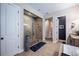 Modern bathroom with a glass-enclosed shower and tiled flooring at 4206 Tour Trce, Land O Lakes, FL 34638