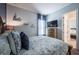 Well-lit bedroom boasting a comfortable queen-size bed, neutral walls, and carpet flooring at 4206 Tour Trce, Land O Lakes, FL 34638