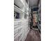Organized walk-in closet with custom shelving and storage solutions at 4206 Tour Trce, Land O Lakes, FL 34638