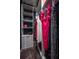Walk-in closet with custom organization and ample storage space at 4206 Tour Trce, Land O Lakes, FL 34638