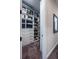 Walk-in closet with built-in shelving and ample storage space at 4206 Tour Trce, Land O Lakes, FL 34638