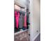 This walk-in closet features custom shelving and hanging rods at 4206 Tour Trce, Land O Lakes, FL 34638