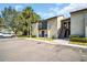 Exterior of condo featuring stair access, parking, and balcony at 4215 E Bay Dr # 1701C, Clearwater, FL 33764
