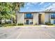 Charming two-story condo with private balcony and well-maintained landscaping at 4215 E Bay Dr # 1701C, Clearwater, FL 33764